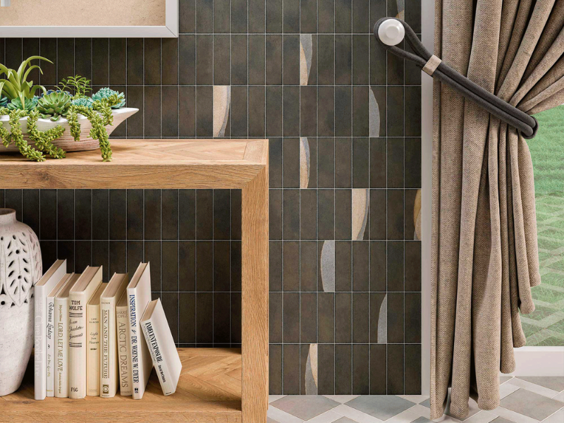 dark gray tile with colorful accents behind a console table