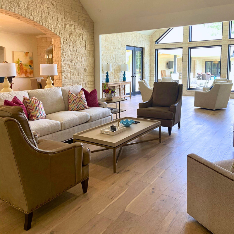 Natural oak hardwood installed in an open-concept living area.