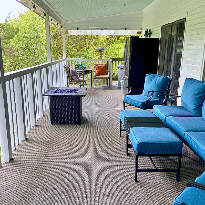 Durable outdoor carpet on an elevated, large patio space.