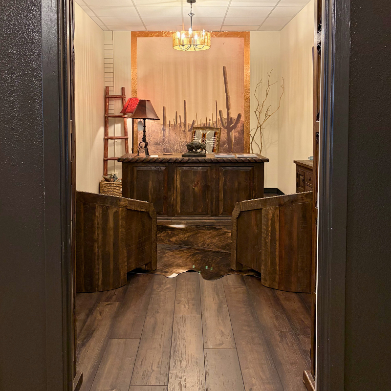Dark luxury vinyl flooring in a Southwestern-themed office.