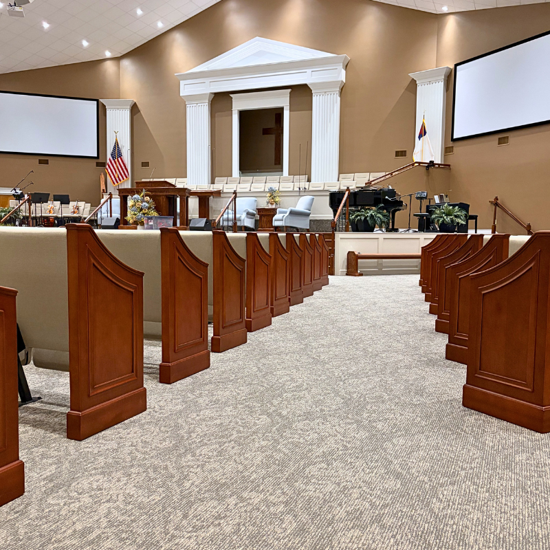 Commercial carpet in a damask pattern in a traditional church sanctuary.