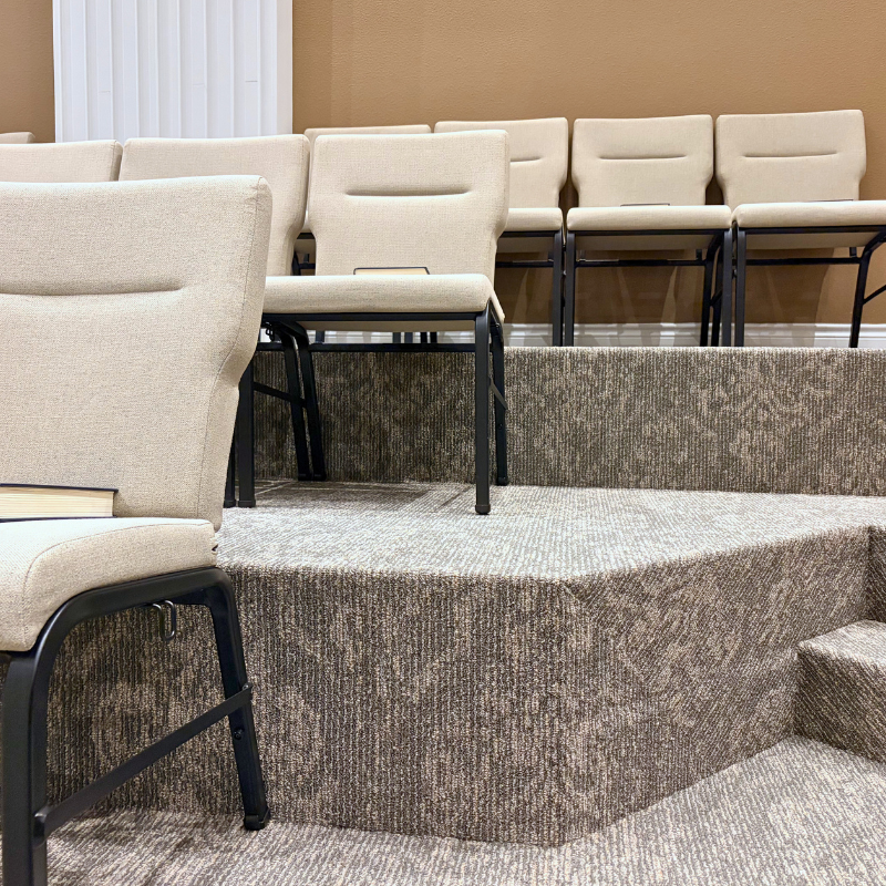 Patterned commercial carpet on a church sanctuary stage.