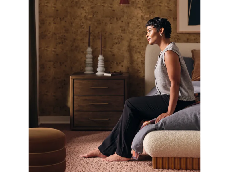 midcentury bedroom with peach carpet